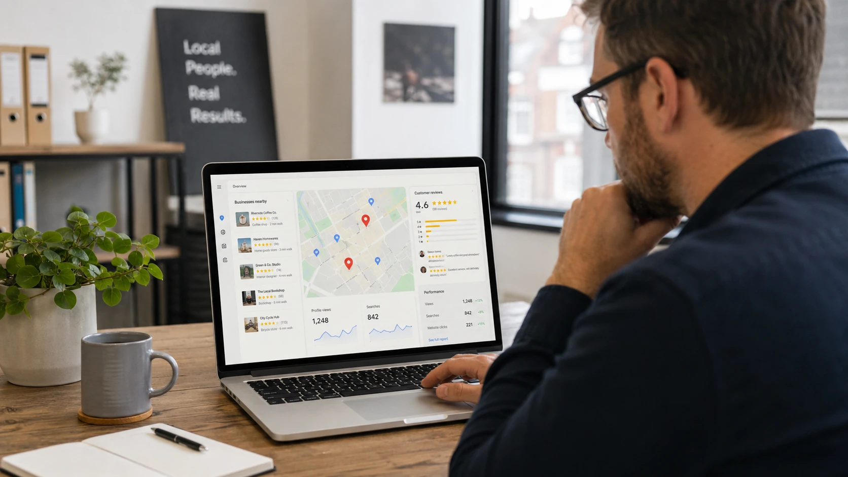 Small business owner reviewing local search results, customer reviews and website analytics on a laptop.
